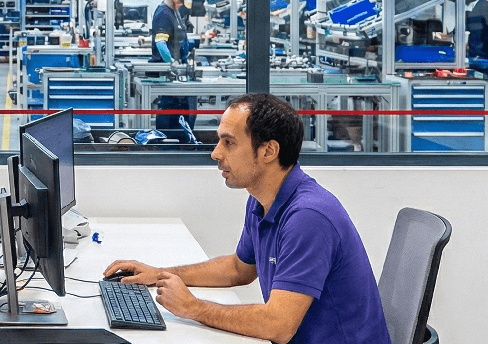 Industrial engineer working at a computer workstation